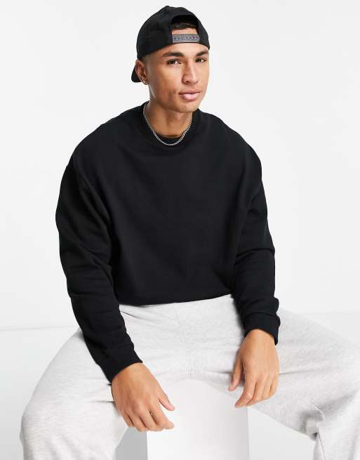 ASOS DESIGN oversized sweatshirt with NFL embroidery and back print in black