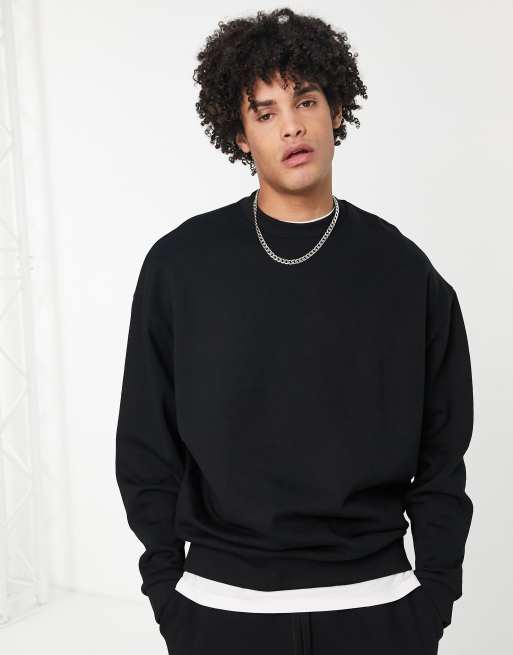 ASOS DESIGN oversized sweatshirt in black with statue back print