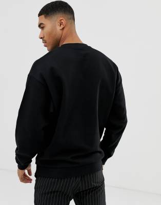 ASOS DESIGN oversized sweatshirt in black | ASOS