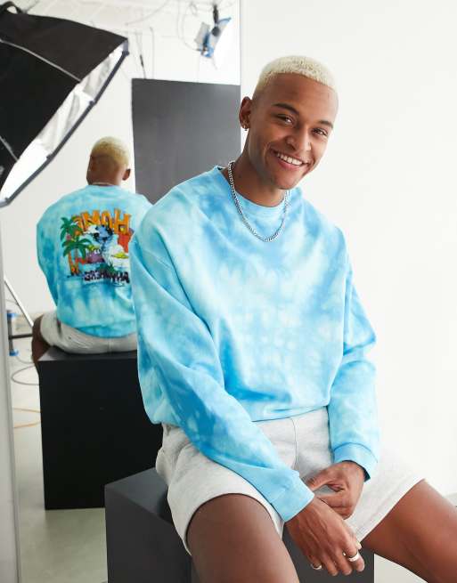 ASOS DESIGN - Oversized sweatshirt in blauwe en witte tie-dye met cartoonprint