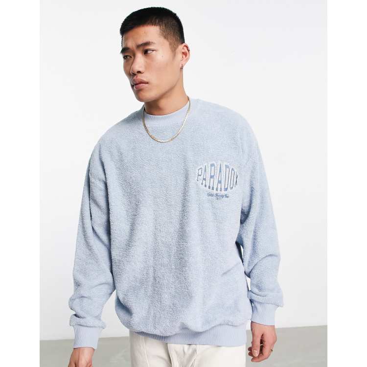 ASOS DESIGN oversized sweatshirt in blue towelling with chest