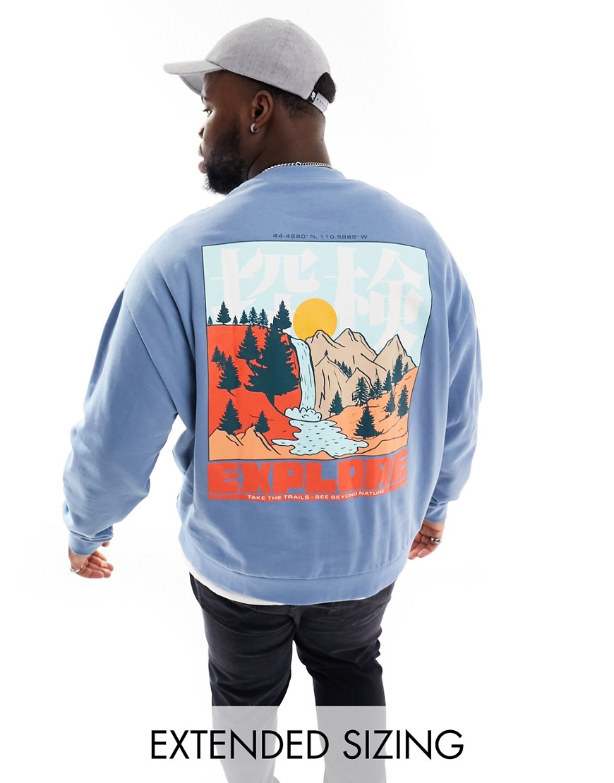 ASOS DESIGN oversized sweatshirt in blue with outdoors back print