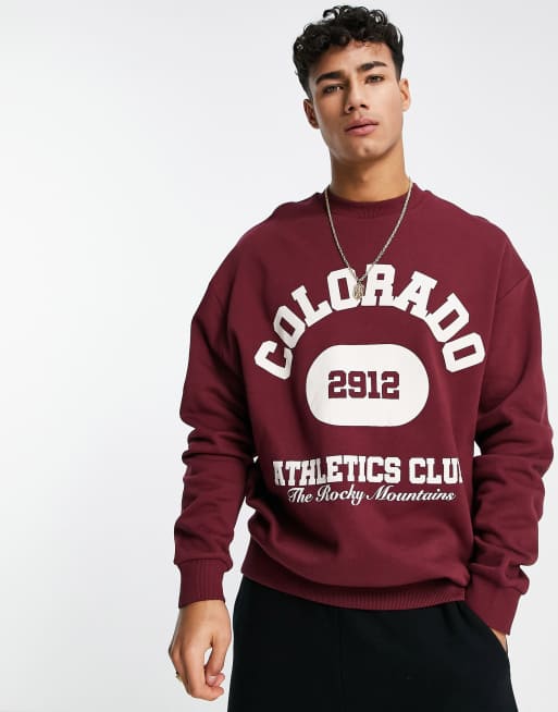 ASOS DESIGN oversized sweatshirt in burgundy with Colorado city print