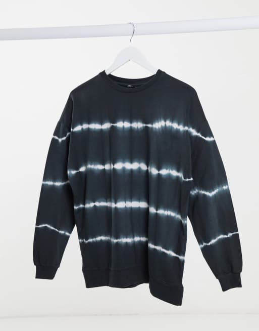 ASOS DESIGN oversized sweatshirt in charcoal with tie dye stripe