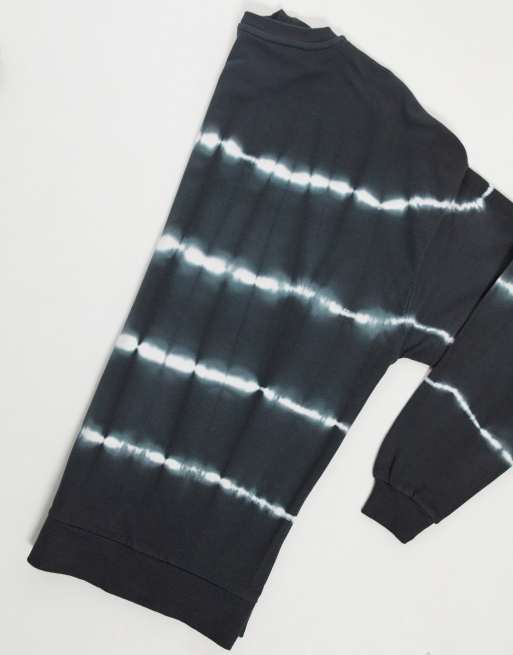 ASOS DESIGN oversized sweatshirt in charcoal with tie dye stripe