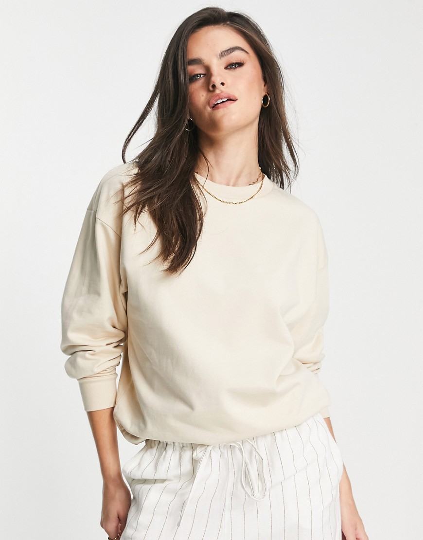 ASOS DESIGN oversized sweatshirt in cream-White