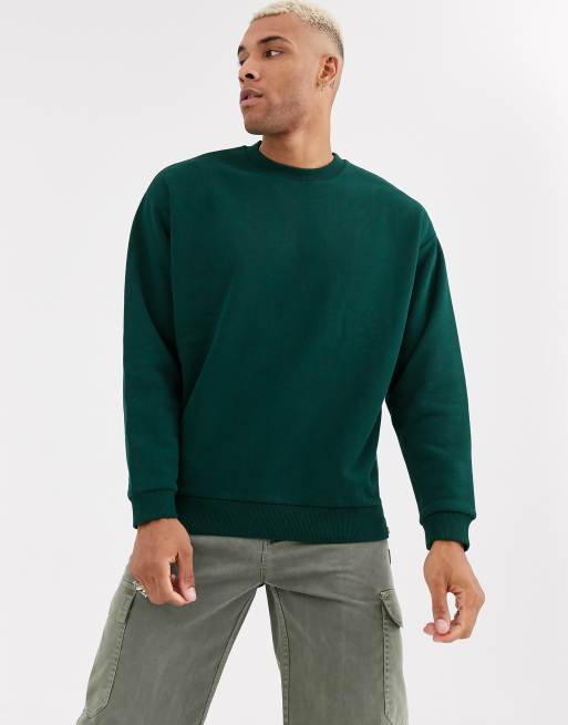 ASOS DESIGN oversized sweatshirt in dark green with silver side zips | ASOS