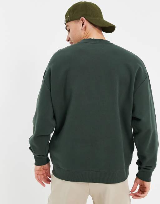 ASOS DESIGN oversized sweatshirt in dark green