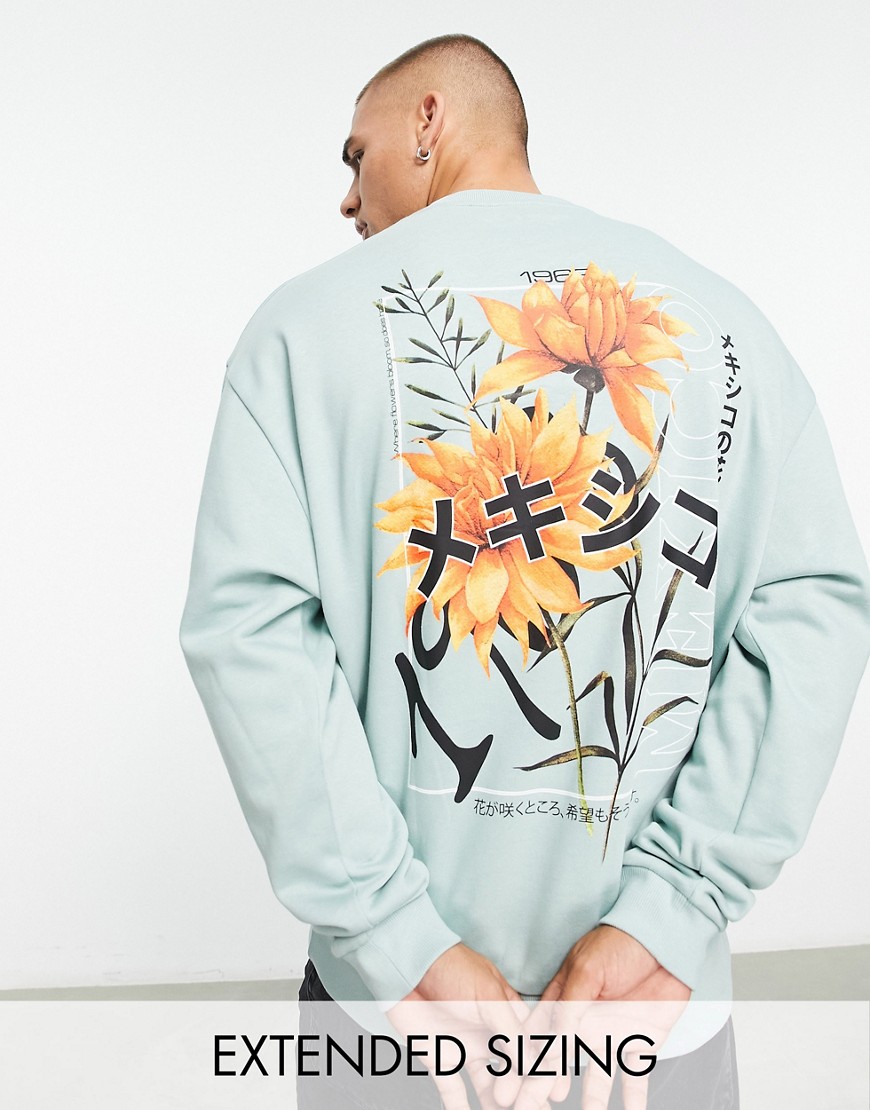 ASOS DESIGN oversized sweatshirt in green with floral back print