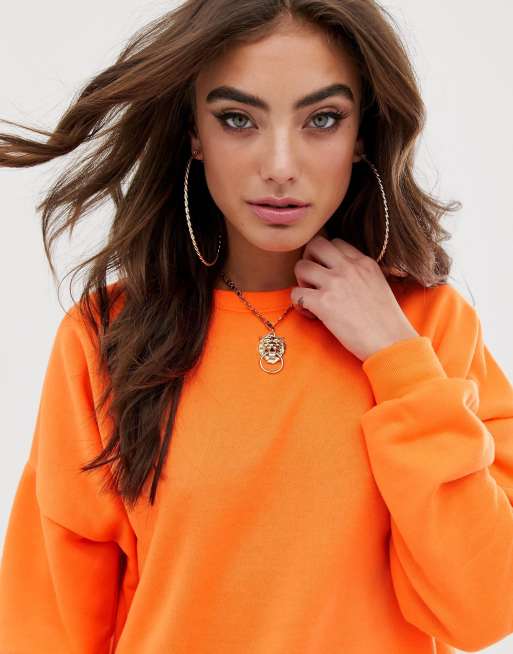 ASOS DESIGN oversized sweatshirt in bright orange