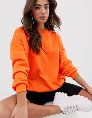 fluorescent orange sweatshirt