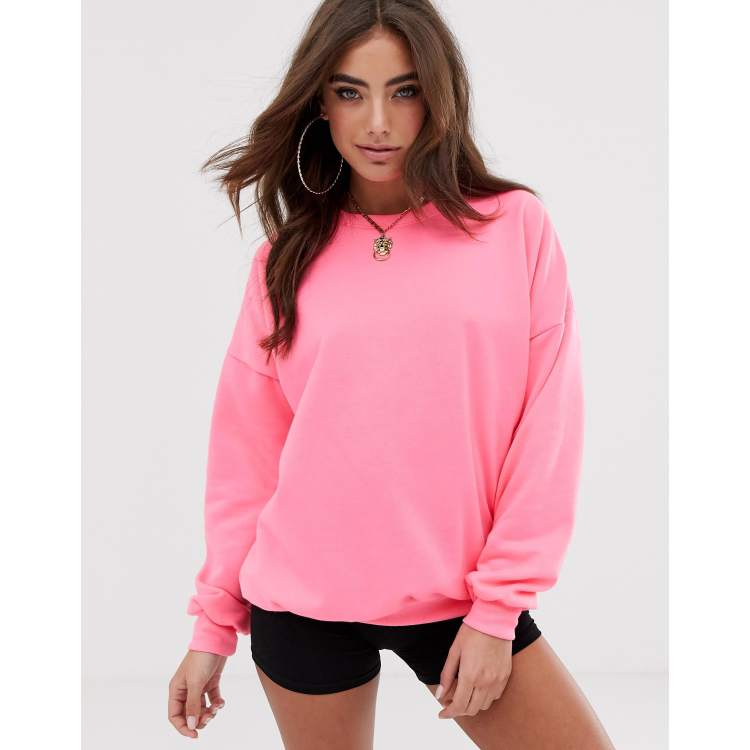 ASOS DESIGN oversized sweatshirt in neon pink