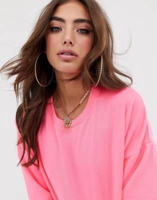 fluorescent pink sweatshirt