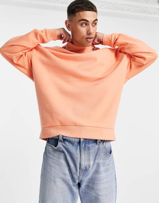 ASOS DESIGN oversized sweatshirt in neon orange