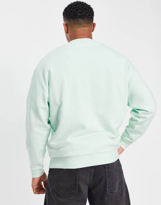 ASOS DESIGN oversized sweatshirt in pastel green