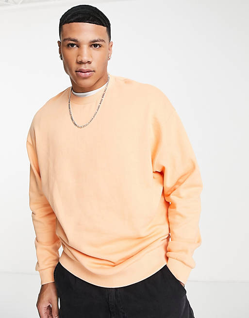 ASOS DESIGN oversized sweatshirt in pastel orange | ASOS