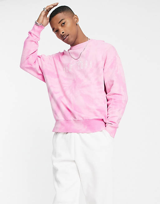 ASOS DESIGN oversized sweatshirt in pink tie dye with New York city embroidery