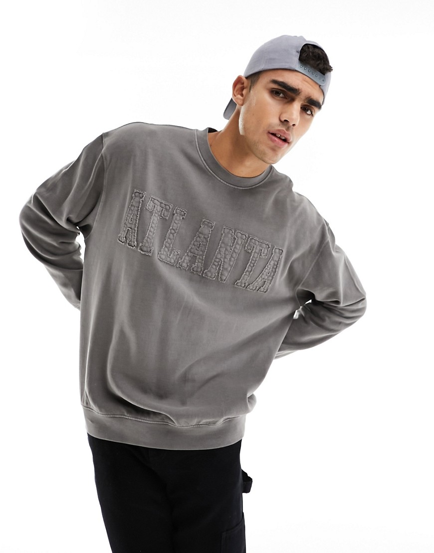 ASOS DESIGN oversized sweatshirt in washed charcoal with Atlanta applique-Grey