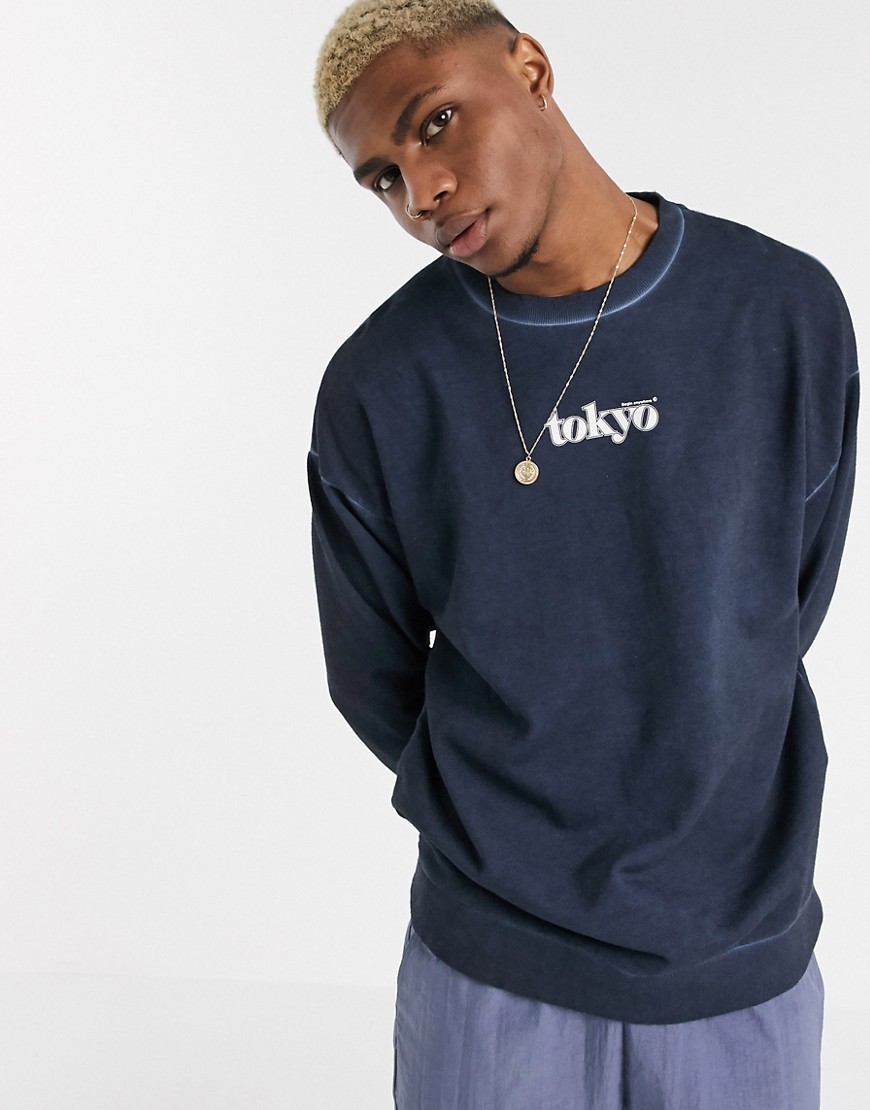 ASOS DESIGN oversized sweatshirt in washed navy with city print