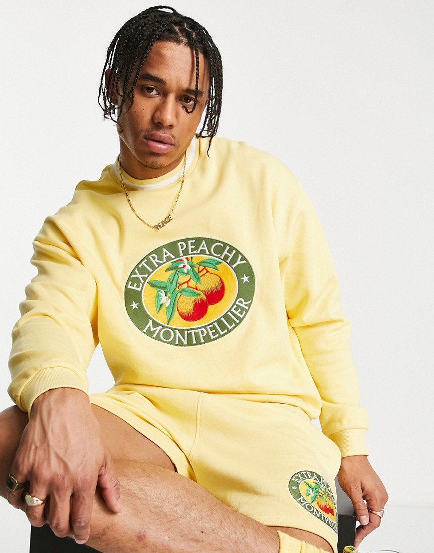 ASOS DESIGN oversized sweatshirt in yellow with fruit print - part of a set