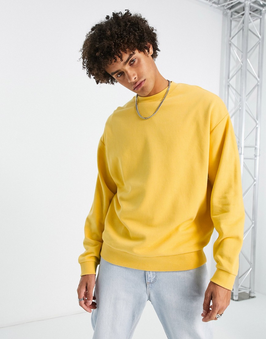 ASOS DESIGN oversized sweatshirt in yellow