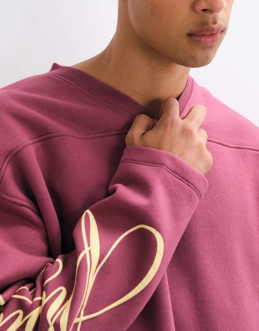 ASOS DESIGN oversized sweatshirt med rund hals og varsity-print i rød, 4 af 5