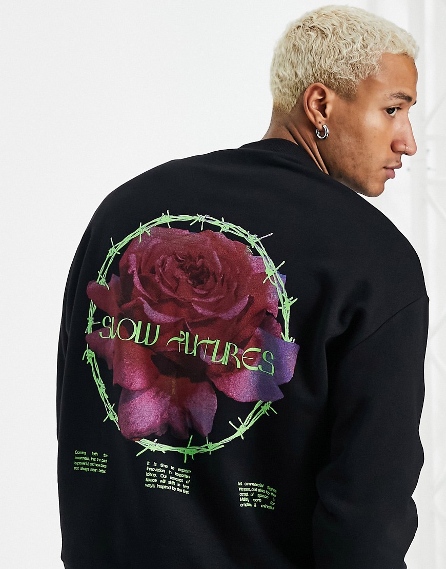 ASOS DESIGN - Oversized sweatshirt met grote bloemenprint op de achterkant in zwart
