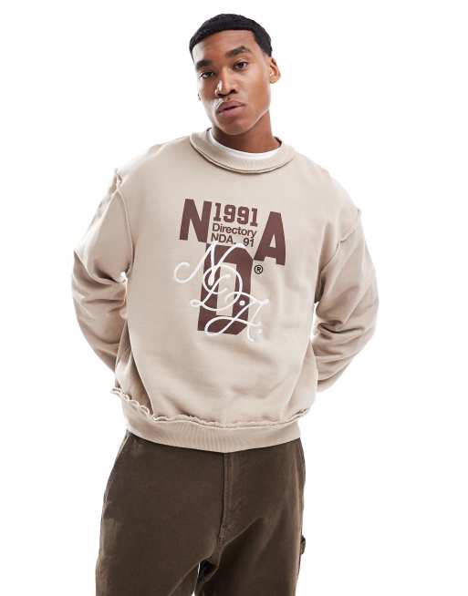 ASOS DESIGN - Oversized sweatshirt met onafgewerkte naden, rechte pasvorm, print en borduursel in beige