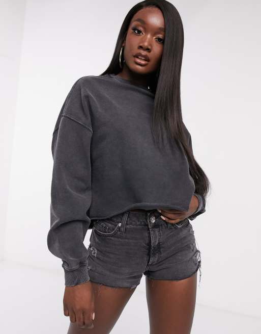 ASOS DESIGN - Oversized sweatshirt met onafgewerkte zoom in zwart met wassing