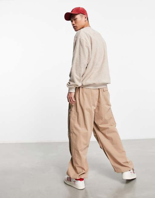 ASOS DESIGN - Oversized sweatshirt van beige badstof met stadsborduursel, 2 van 4