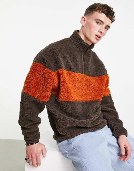 ASOS DESIGN - Oversized sweatshirt van teddy borg met korte rits en kleurvlakken in bruin