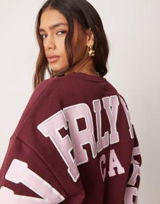 ASOS DESIGN oversized sweatshirt with Beverly hills back graphic in burgundy-Red