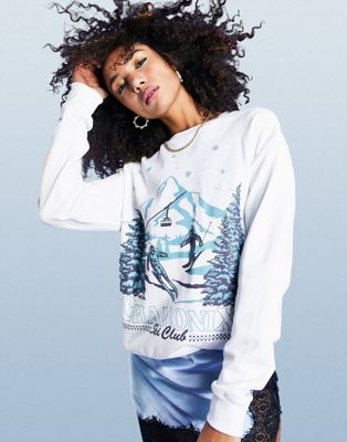 ASOS DESIGN oversized sweatshirt with chamonix apres print in white