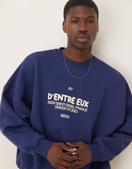 ASOS DESIGN oversized sweatshirt with chest print in navy