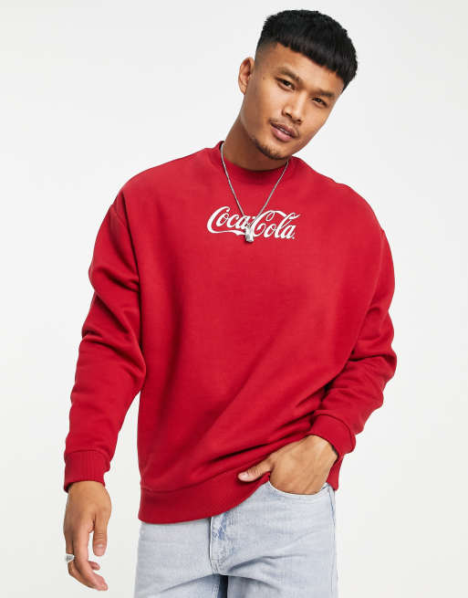 ASOS DESIGN oversized sweatshirt with Coca Cola print in red