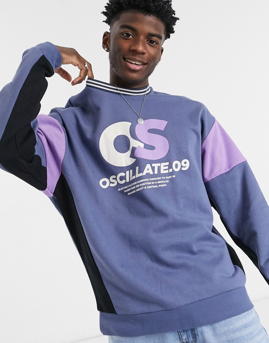 ASOS DESIGN oversized sweatshirt with color block panels & retro sport chest print-Blues