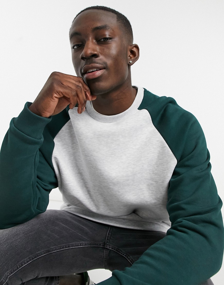 ASOS DESIGN oversized sweatshirt with contrast raglan sleeves in white marl & forest green
