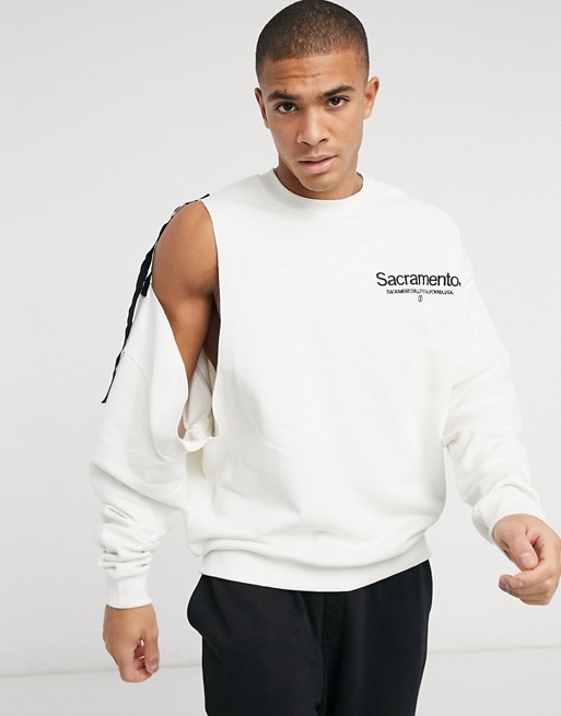 ASOS DESIGN oversized sweatshirt with disconnected sleeve detail strapping & chest embroidery