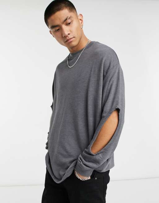 ASOS DESIGN oversized sweatshirt with elbow cut out in washed black
