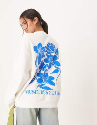 Asos Design Oversized Sweatshirt With Floral Art Graphic In Blue