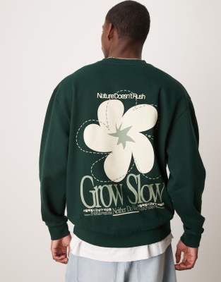 ASOS DESIGN oversized sweatshirt with floral print in green - view 1