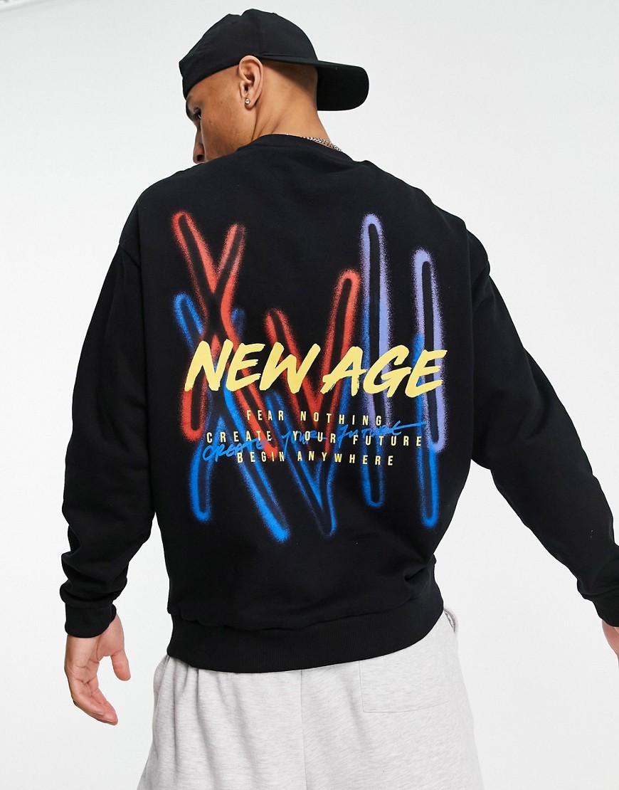 ASOS DESIGN oversized sweatshirt with graffiti back graphic in black