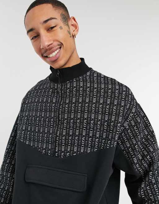 ASOS DESIGN oversized sweatshirt with half zip & Chicago repeat print panel in black