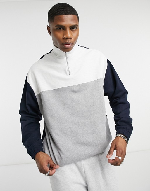 ASOS DESIGN oversized sweatshirt with half zip in grey marl colour blocking