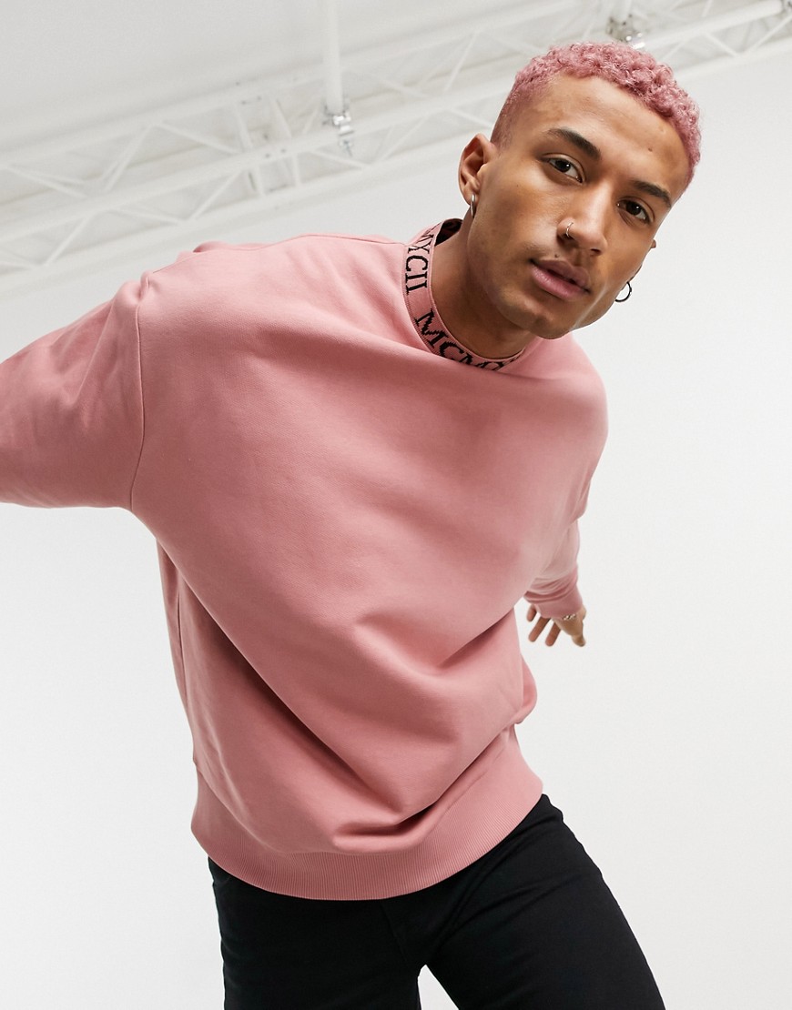 ASOS DESIGN oversized sweatshirt with jacquard neck and ribbed trim-Pink