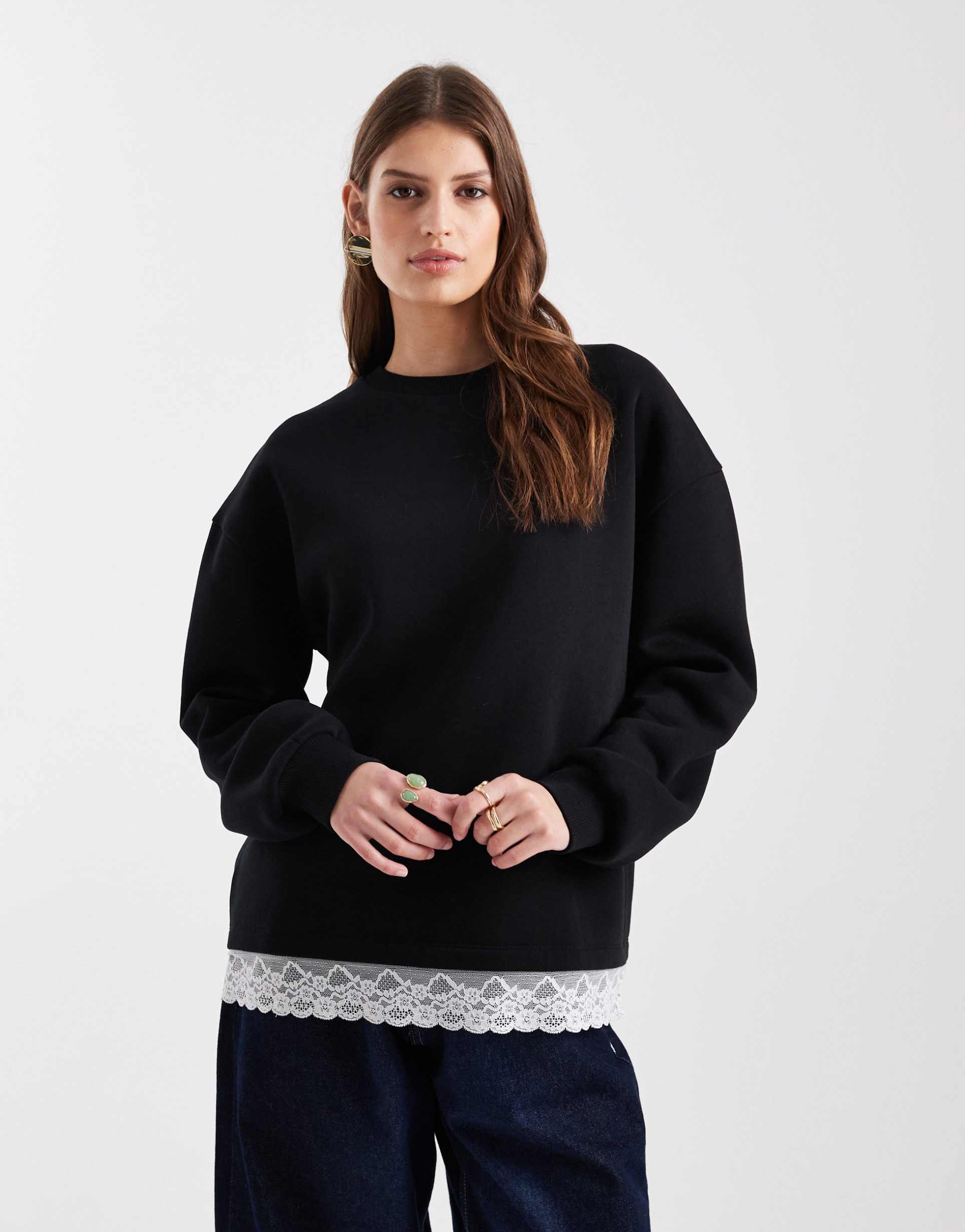asos design oversized sweatshirt with lace hem detail in black