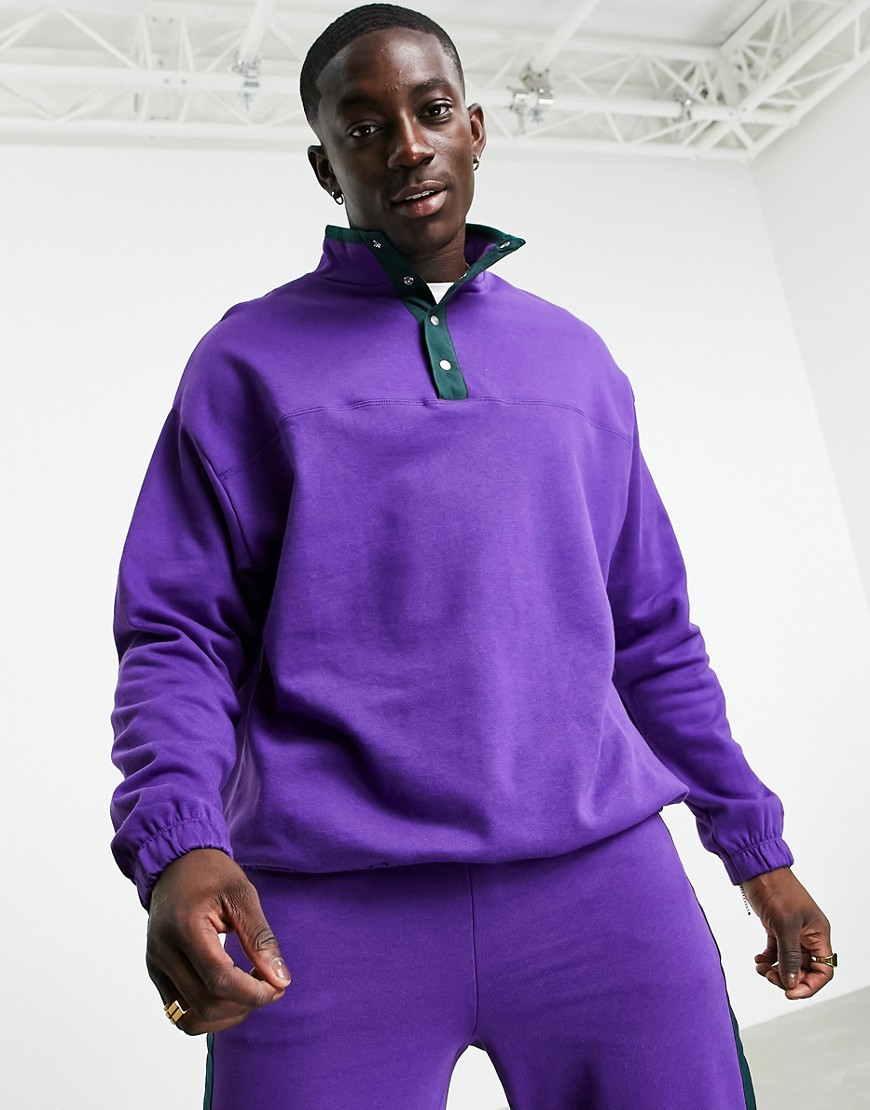 ASOS DESIGN oversized sweatshirt with map pocket & woven placket in purple - part of a set