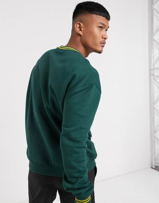 ASOS DESIGN oversized sweatshirt with Philadelphia Eagles print in green