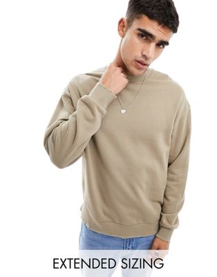 ASOS DESIGN oversized sweatshirt with nibbled hem and cuff in beige