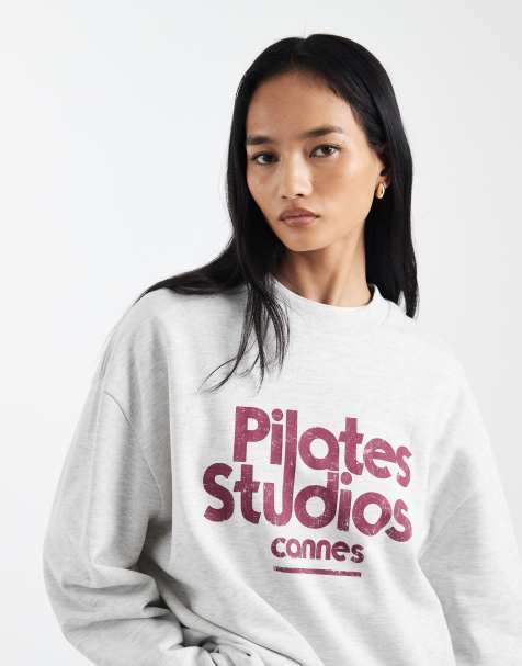 ASOS DESIGN oversized sweatshirt with pilates studio graphic in ice marl